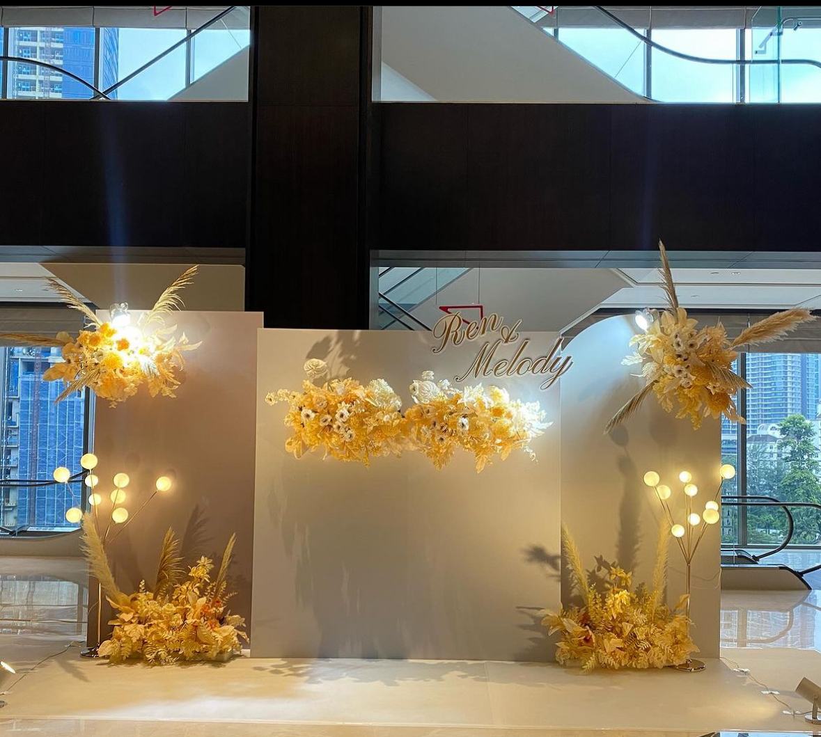 Wedding backdrop with golden florals